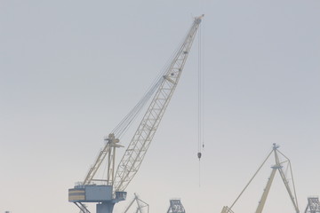 Fototapeta na wymiar high harbor cranes