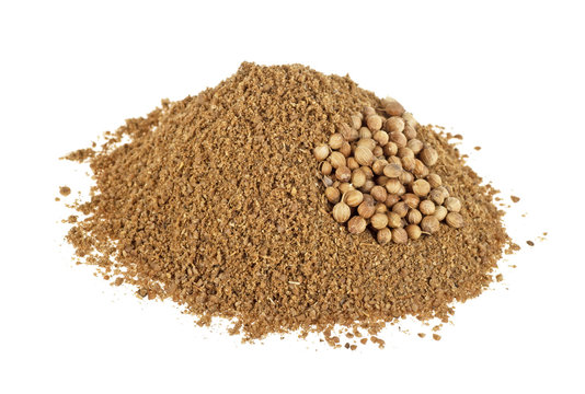 Coriander seeds and powder isolated on a white background