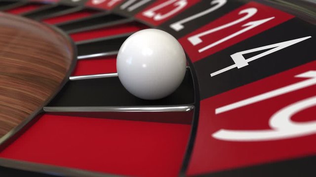 Casino roulette wheel ball hits 4 four black