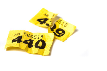 Torn Up Yellow raffle ticket. Losing number