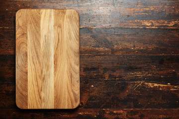 chopping boards on a wooden background