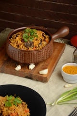 Rice with meat and mushrooms