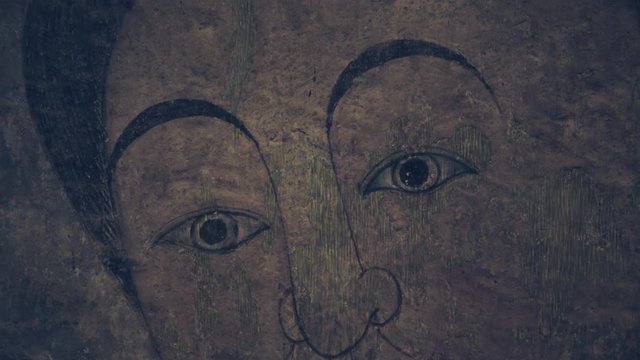 mural painting portrait of a woman looking forward close up shot