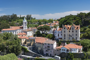 Fototapeta na wymiar Nice white houses with orange tiled roof in Sintra, Potugal