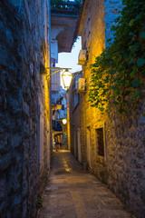  Narrow streets of the old evening Budva in Montenegro
