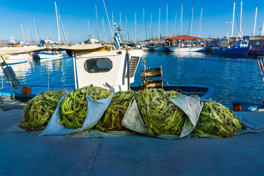 Traditional fishing boat with nets in Lavrio Greece