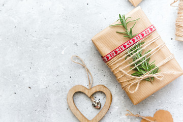 Modern gifts in paper on vintage  table with copy space. Valentines day hearts background. View from above. Flat lay..