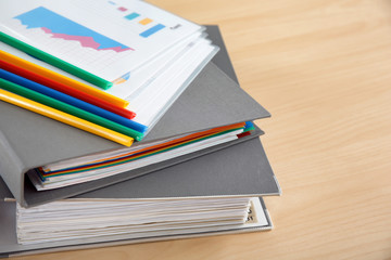 Stack of documents on table