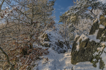 View from Semnicka rock with cloudy sun and snow in west Bohemia