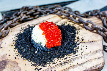 Sandwich with red caviar. Fancy chef