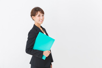 ファイルを持つ女性　ビジネス
