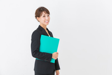 ファイルを持つ女性　ビジネス