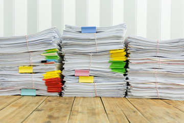 Paperwork pile messy of business financial put on desk
