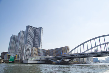 Fototapeta na wymiar Kachidoki bridge and Sumida river