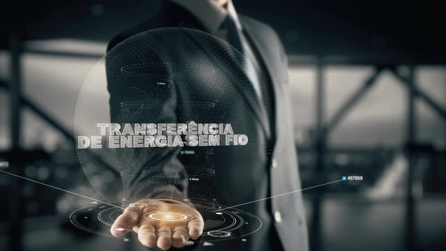 Transfer&ecirc;ncia de energia sem fio with hologram businessman concept, in English Wireless power transfer