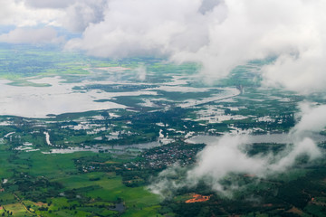 Rain cloud with swamps and large fields