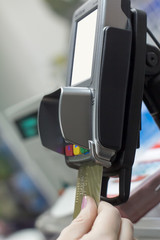 Credit card with electronic payment terminal