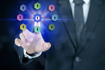 Businessman pointing his finger with connection chart template,teamwork concept