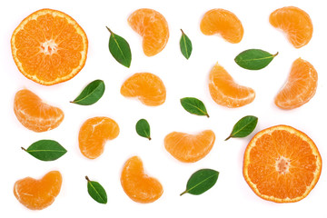 Fototapeta na wymiar lobules of mandarin or tangerine with leaves isolated on white background. Flat lay, top view. Fruit composition