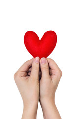 Fototapeta premium woman hands holding heart figure made from red fabric isolated on white