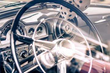 Close-up, detailed photo of the interior, dashboard steering wheel and speedometer of a classic...