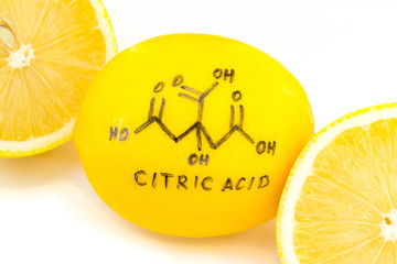 structure of a citric acid molecule painted on lemon peel