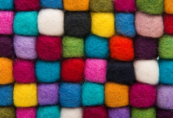 Fototapeta na wymiar close-up of colored felted balls