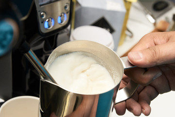 Coffee with milk. Aromatic drink. Cooking process