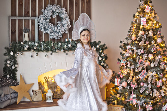 The girl dressed as the snow Maiden granddaughter of Santa Claus 9917.