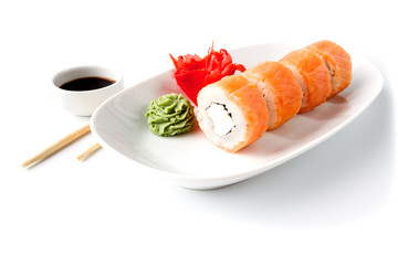 Japanese traditional Cuisine - Roll with Cucumber , Cream Cheese with raw Tuna(maguro) inside. on white dish with sticks isolated over white background