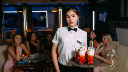 career start concept. Low paid and low skill job of waitering for a young student. Motivation and future plans of becoming successful