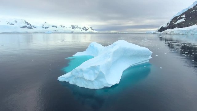 The blue glacier floats in the bay off the coast of the Antarctic. Andreev.