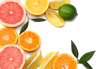 healthy food. mix sliced lemon, green lime, orange, mandarin and grapefruit with green leaf isolated on white background. top view with copy space