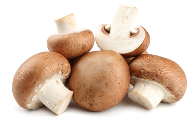 Fresh champignon mushrooms isolated on white background