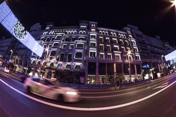 Fisheye. Christmas lights in the streets of the Madrid City, Spain. Gran Via street