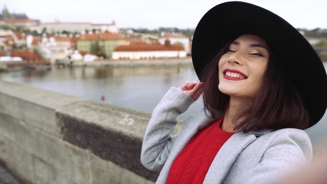 Young woman, making selfie in Prague