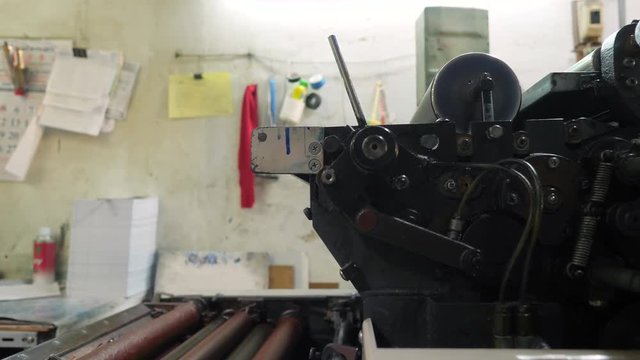 Vintage Old Printing Machine Press in Retro Typography. Process of Offset Print. 4K.
