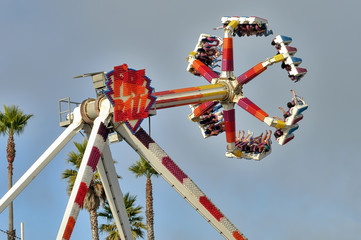 Amusement park ride high in the air.