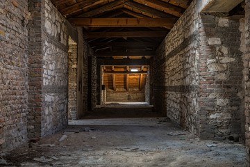 Fototapeta premium Creepy attic interior at abandoned building
