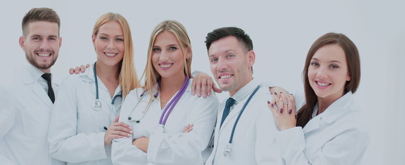 Confident doctors posing and smiling at camera