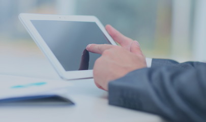 man holding digital tablet, closeup