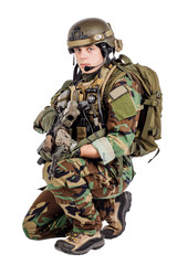 Soldier with rifle isolated on a white background. war, army, weapon and people concept.