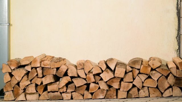 stacking of firewood along the wall