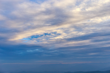 Fototapeta premium Beautiful cloudy weather in mountains, cloudy and fog