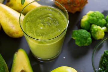 Close up of fresh fruits and vegetables smoothie