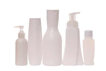 cosmetic  tare, white bottles for  shampoo and hair conditioner; isolated  vials on white
