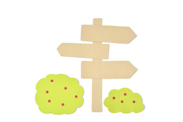 Fototapeta premium Blank wooden direction signpost and bush paper cut on white background - isolated