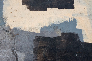 Paint obscures grafitti on the concrete sidewalk at a scenic overlook in Talladega National Forest, Alabama, USA