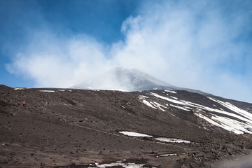 Smoking summit of Etna volcano, Sicily, Italy.