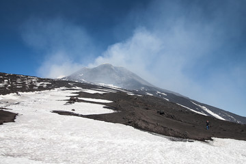 Smoking summit of Etna volcano, Sicily, Italy.